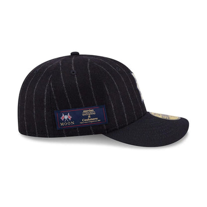 Pictured is this MLB X Moon Boston Red Sox 59FIFTY Fitted cap in Navy. 5