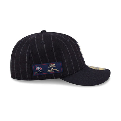 Pictured is this MLB X Moon Boston Red Sox 59FIFTY Fitted cap in Navy. 5
