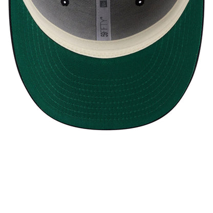 Boston Red Sox MLB X Moon Navy New Era 59FIFTY Fitted Cap, inside view showing the grey branded taping, white sweatband, and dark green undervisor with black eyelets on the structured crown.