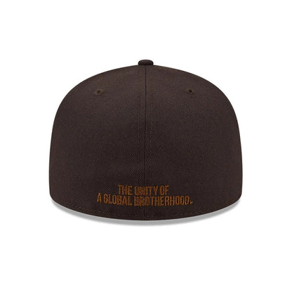 New York Black Yankees MLB Negro League Dark Brown New Era 59FIFTY Fitted Cap, rear view showing brown embroidered text The Unity of a Global Brotherhood along the base of the structured dark brown crown.