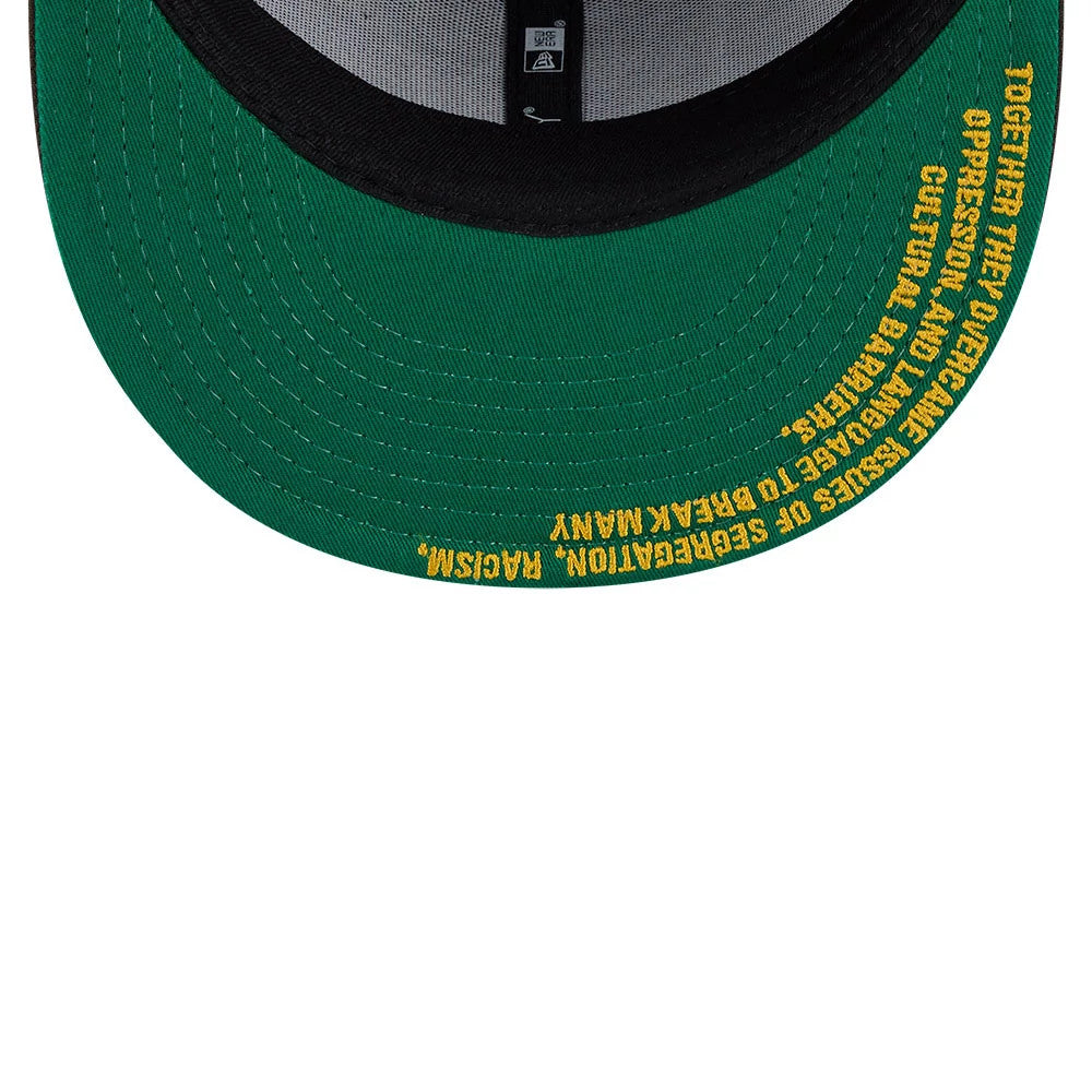 New York Black Yankees MLB Negro League Dark Brown New Era 59FIFTY Fitted Cap, inside view showing green undervisor with yellow embroidered text, black sweatband, and grey interior taping featuring a size label.