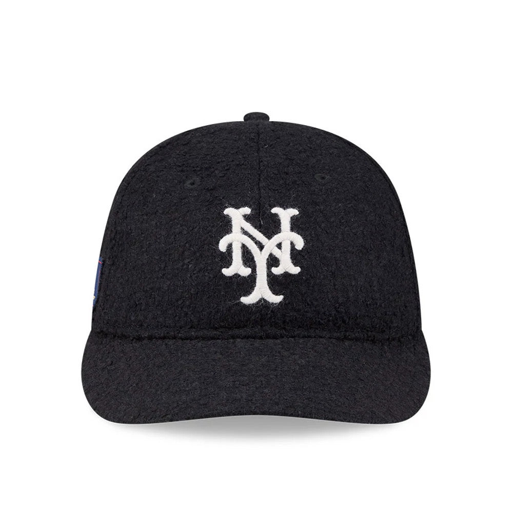 New York Mets MLB X Moon Navy Retro Crown New Era 9FIFTY Adjustable Cap, front view showing the white embroidered NY logo on the unstructured navy crown with a matching curved visor and embroidered eyelets.