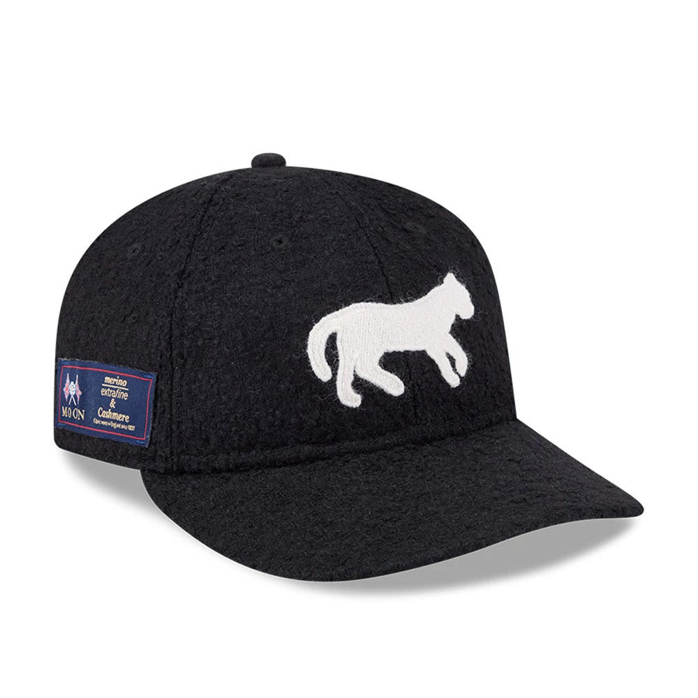 Detroit Tigers MLB X Moon Navy Retro Crown New Era 9FIFTY Adjustable Cap, three-quarter view showing a white embroidered leaping tiger on the front panel and a Moon textile patch on the left side of the navy crown.