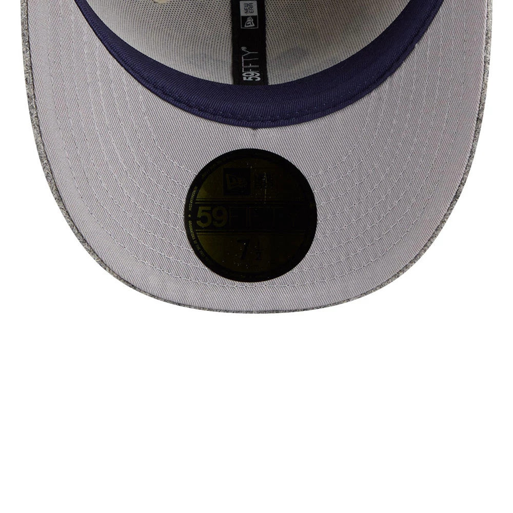 Chicago White Sox MLB X Moon Light Beige New Era 59FIFTY Fitted Cap, inside view showing a navy undervisor, dark gold 59FIFTY size sticker on the beige fabric, black sweatband, and New Era branded taping.