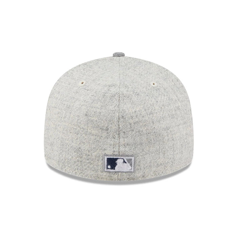 New York Yankees MLB X Moon Light Beige New Era 59FIFTY Fitted Cap, rear view showing the grey embroidered MLB Batterman logo at the centre of the back panels, with a textured light beige crown and matching top button.