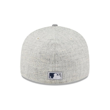 New York Yankees MLB X Moon Light Beige New Era 59FIFTY Fitted Cap, rear view showing the grey embroidered MLB Batterman logo at the centre of the back panels, with a textured light beige crown and matching top button.