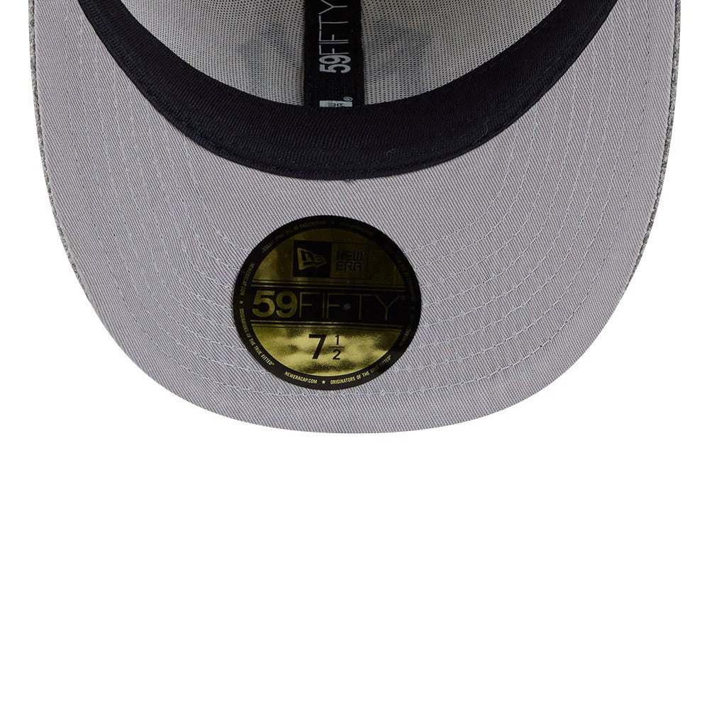 New York Yankees MLB X Moon Light Beige New Era 59FIFTY Fitted Cap, inside view showing a grey undervisor with a black sweatband, branded black taping, and a gold 59FIFTY size sticker displayed prominently.
