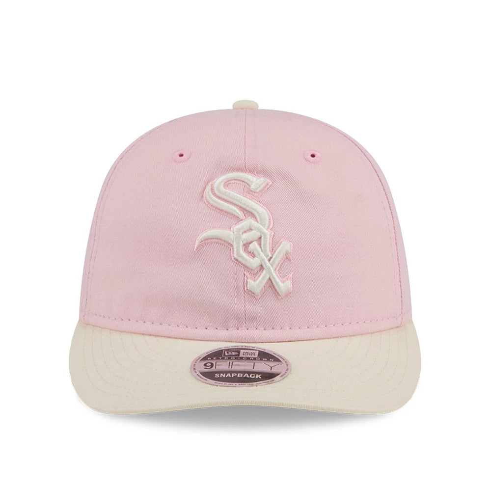 Pictured is this MLB Washed Tie Dye Chicago White Sox 9FIFTY Snapback cap in pastel pink. 2