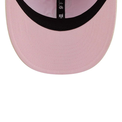Pictured is this MLB Washed Tie Dye Chicago White Sox 9FIFTY Snapback cap in pastel pink. 7