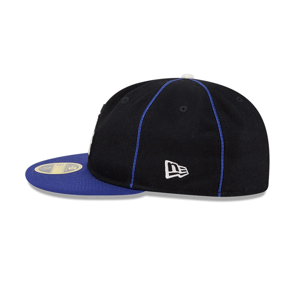 Pictured is this MLB Felt Logo LA Dodgers Retro Crown 59FIFTY Fitted cap in dark blue. 5