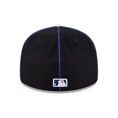 Pictured is this MLB Felt Logo LA Dodgers Retro Crown 59FIFTY Fitted cap in dark blue. 7