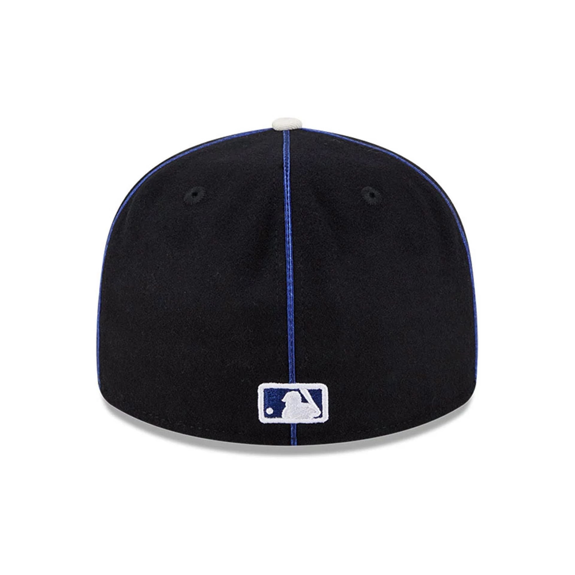 Pictured is this MLB Felt Logo LA Dodgers Retro Crown 59FIFTY Fitted cap in dark blue. 7