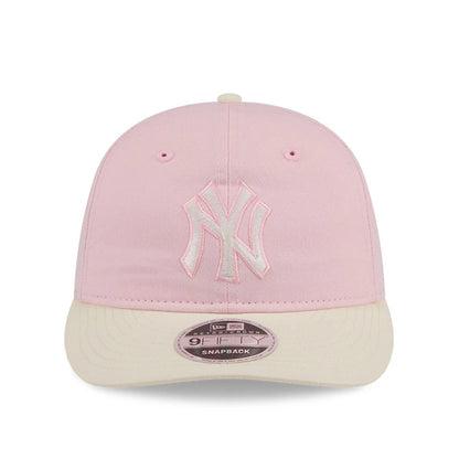 Pictured is this MLB Washed Tie Dye New York Yankees 9FIFTY Snapback cap in pastel pink. 2