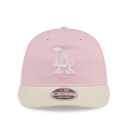 Pictured is this MLB Washed Tie Dye LA Dodgers 9FIFTY Snapback cap in pastel pink. 2
