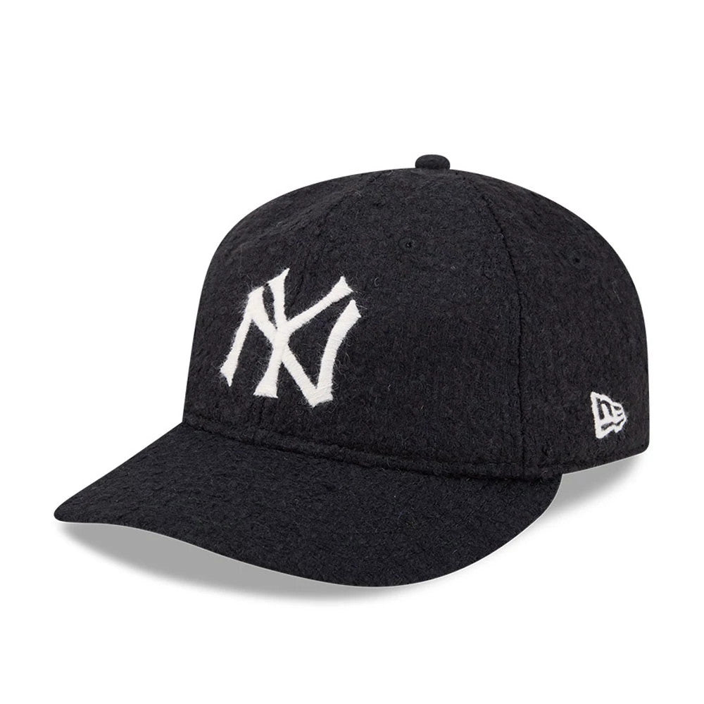 New York Yankees MLB X Moon Navy Retro Crown New Era 9FIFTY Adjustable Cap, front view showing the large white embroidered NY Yankees logo on the front panel, with a textured navy crown, navy curved visor.