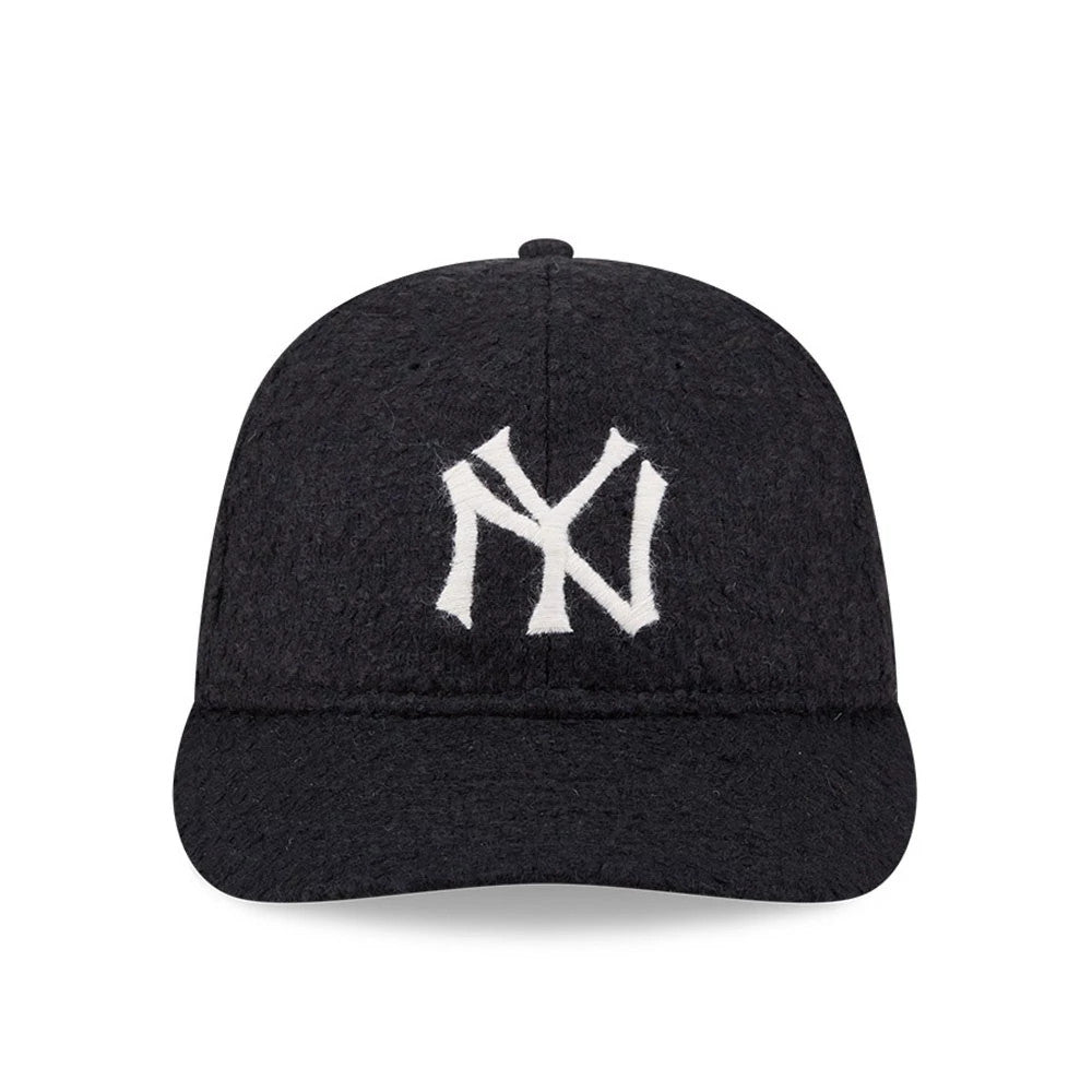 New York Yankees MLB X Moon Navy Retro Crown New Era 9FIFTY Adjustable Cap, front view showing the white raised embroidered NY logo on the navy textured fabric front panel, with a slightly curved visor and top button.