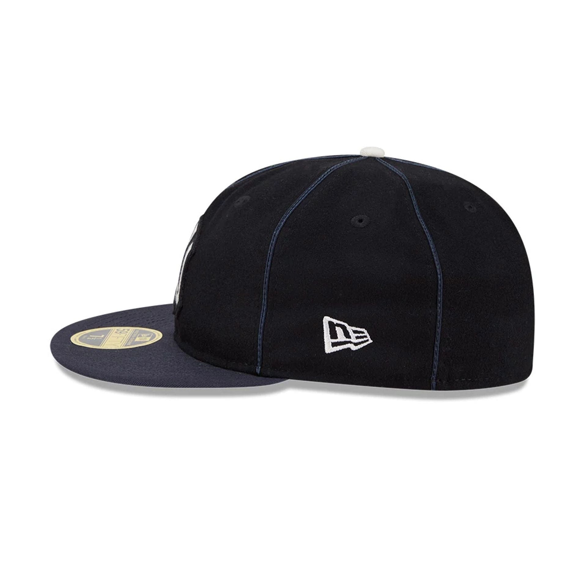 Pictured is this MLB Felt Logo New York Yankees Retro Crown 59FIFTY Fitted cap in navy. 5