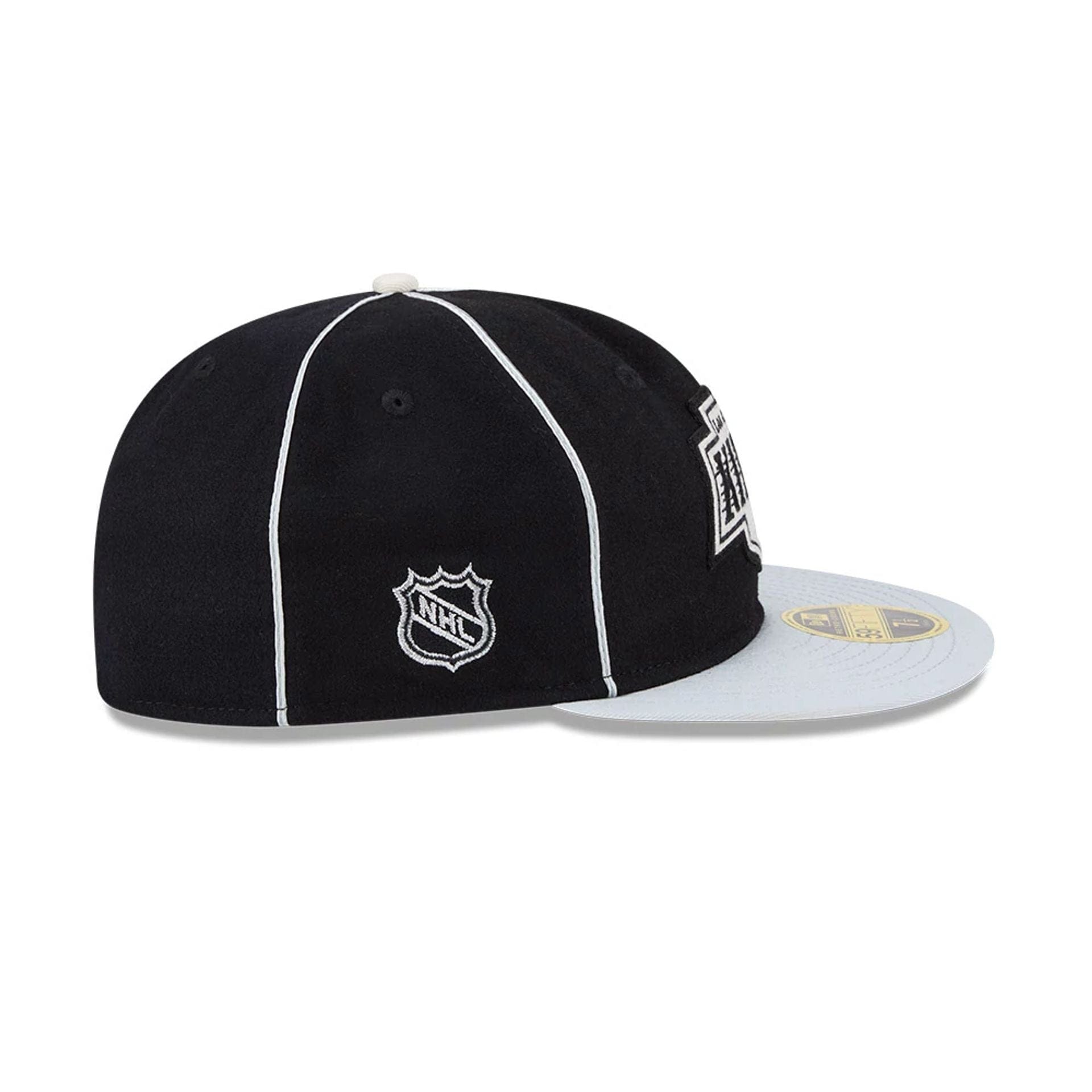 Pictured is this NHL Felt Logo LA Kings Retro Crown 59FIFTY Fitted cap in black. 6