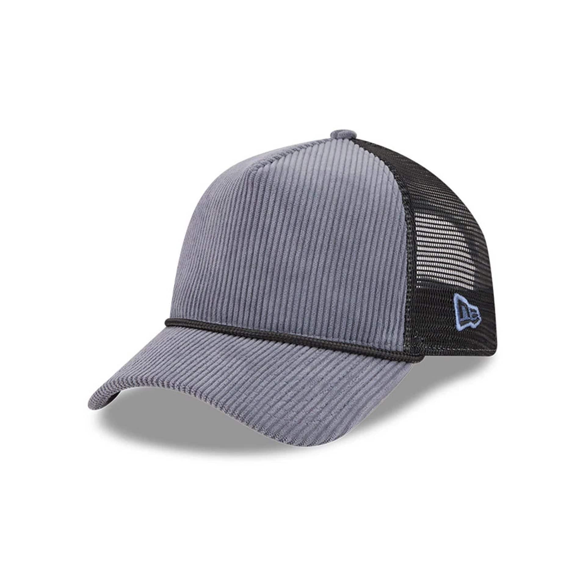 Pictured is this New Era Wide Cord 9FORTY A-Frame Trucker cap in dark blue. 1