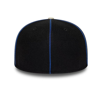 Pictured is this NBA Felt Logo New York Knicks Retro Crown 59FIFTY Fitted cap in dark blue. 7