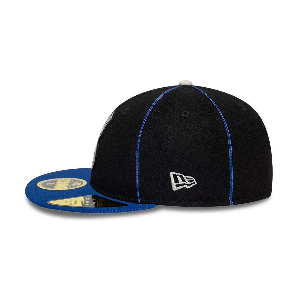Pictured is this NBA Felt Logo New York Knicks Retro Crown 59FIFTY Fitted cap in dark blue. 6