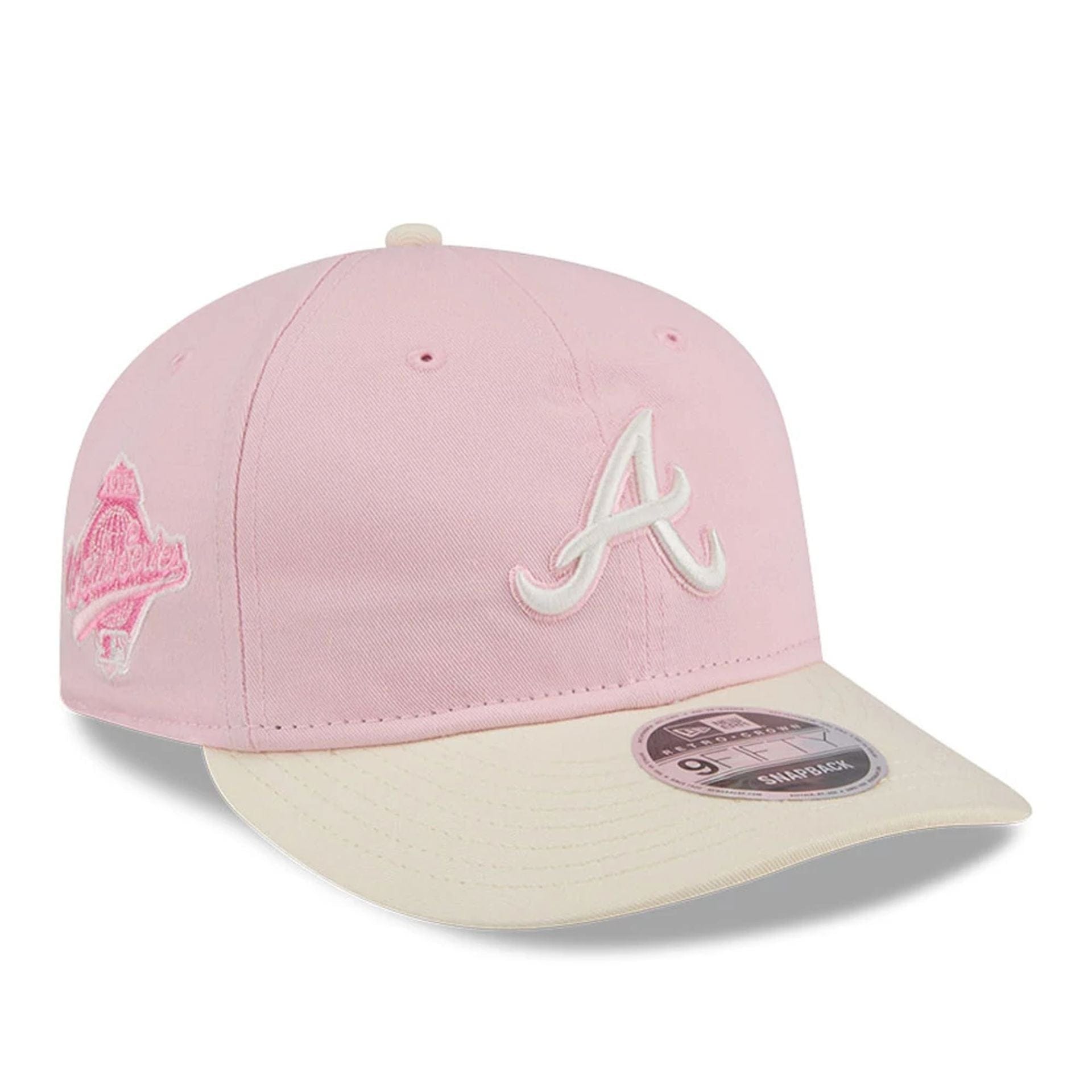 Pictured is this MLB Washed Tie Dye Atlanta Braves 9FIFTY Snapback cap in pastel pink. 1