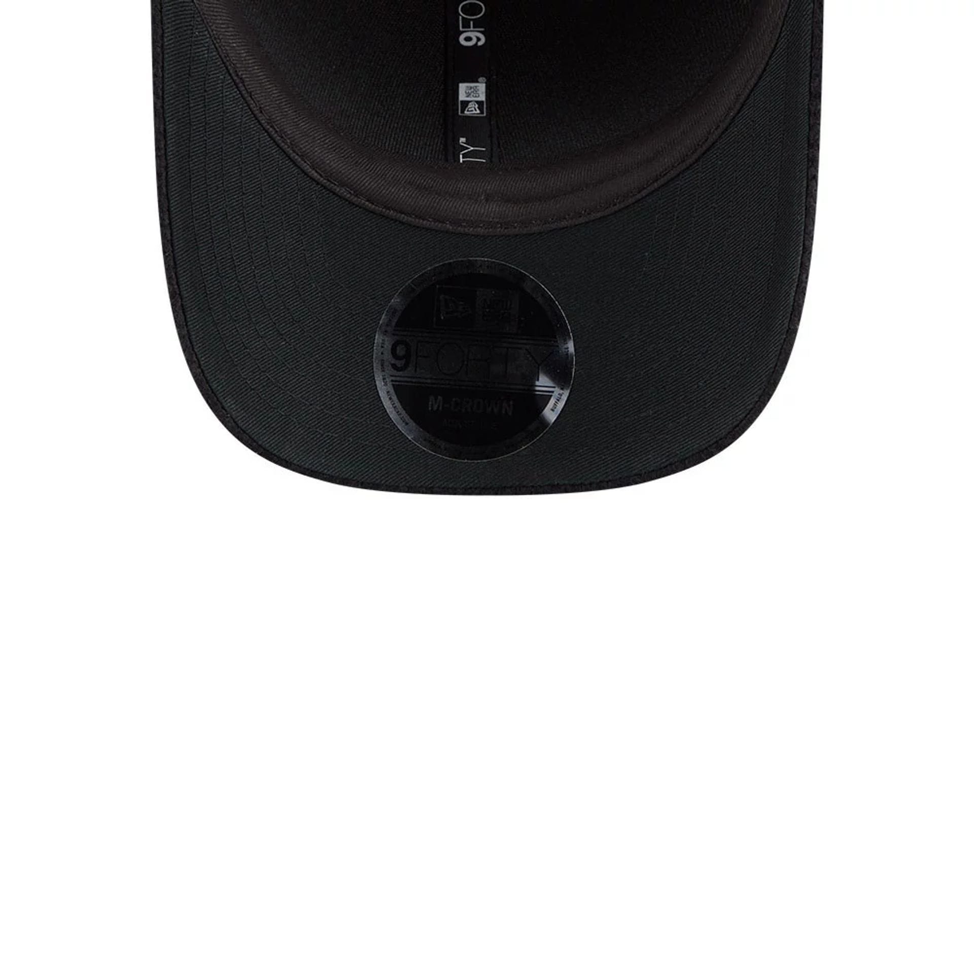Pictured is this New Era Brushed Fleece 9FORTY M-Crown cap in black. 7
