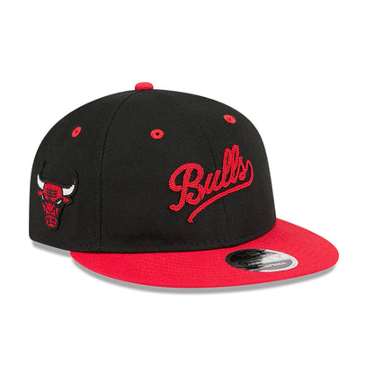Pictured is this NBA Chainstitch Script Chicago Bulls Retro Crown 9FIFTY cap in black. 1