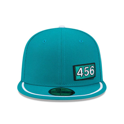 Pictured is this Netflix Squid Game 456 Patch 59FIFTY Fitted cap in green. 3