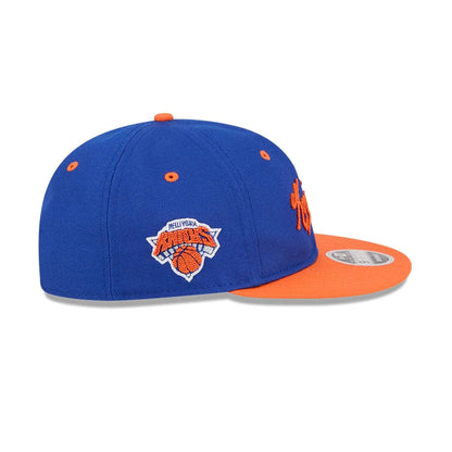 Pictured is this NBA Chainstitch Script New York Knicks Retro Crown 9FIFTY cap in blue. 5