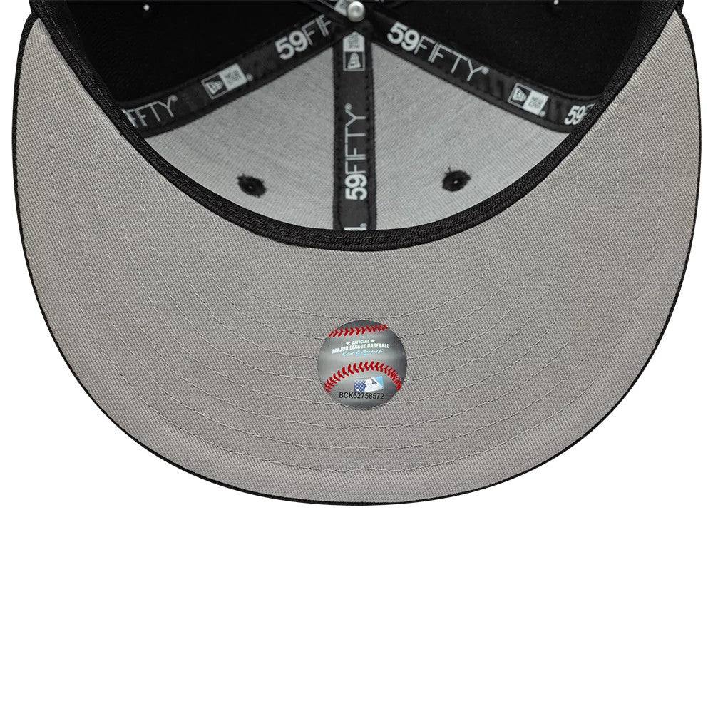 Athletics MLB Faux Pearl Black New Era 59FIFTY Fitted Cap, inside view showing a grey undervisor with a central round graphic sticker resembling a baseball, black sweatband with white 59FIFTY taping, and six-panel black interior crown.
