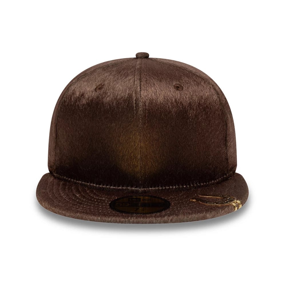 Pictured is this New Era Faux Pony 59FIFTY Fitted cap in dark brown. 2