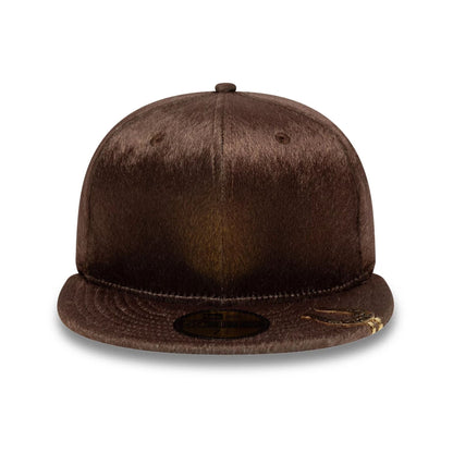 Pictured is this New Era Faux Pony 59FIFTY Fitted cap in dark brown. 2