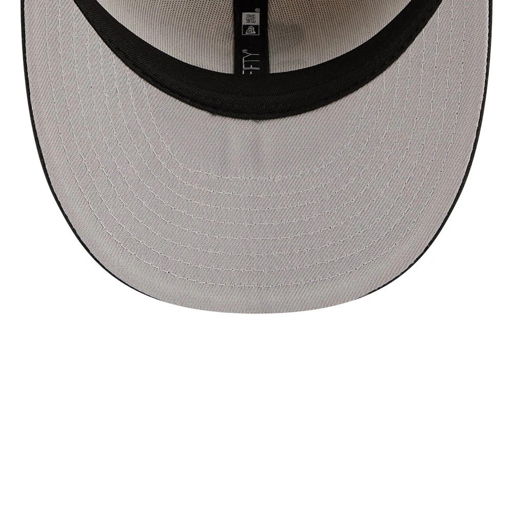 Chicago White Sox MLB Twine Beige New Era 59FIFTY Fitted Cap, inside view showing the black sweatband, grey undervisor, and the New Era label sewn onto the taping along the cap's interior.