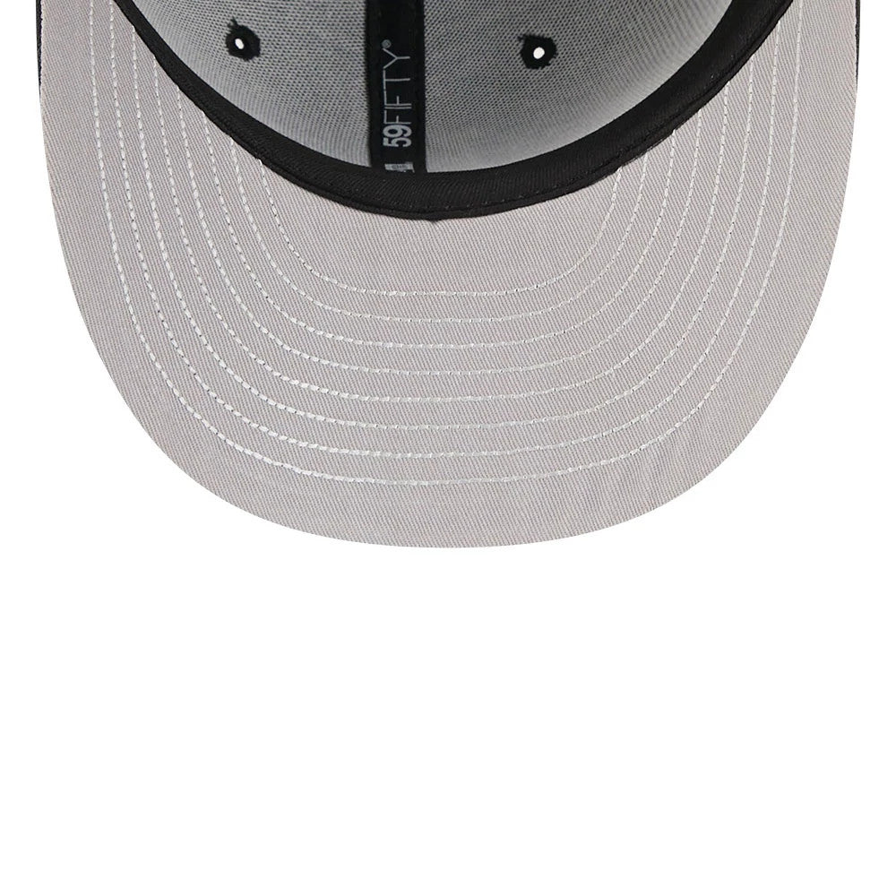 LA Dodgers MLB Eagle Black New Era 59FIFTY Fitted Cap, inside view showing the grey undervisor with white stitching details, black sweatband along the edge, and a black 59FIFTY taping running down the centre of the cap.