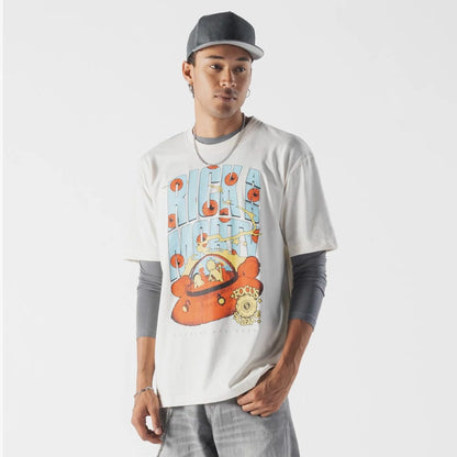 The model is wearing this Rick And Morty Spaceship T-Shirt in cream. 1