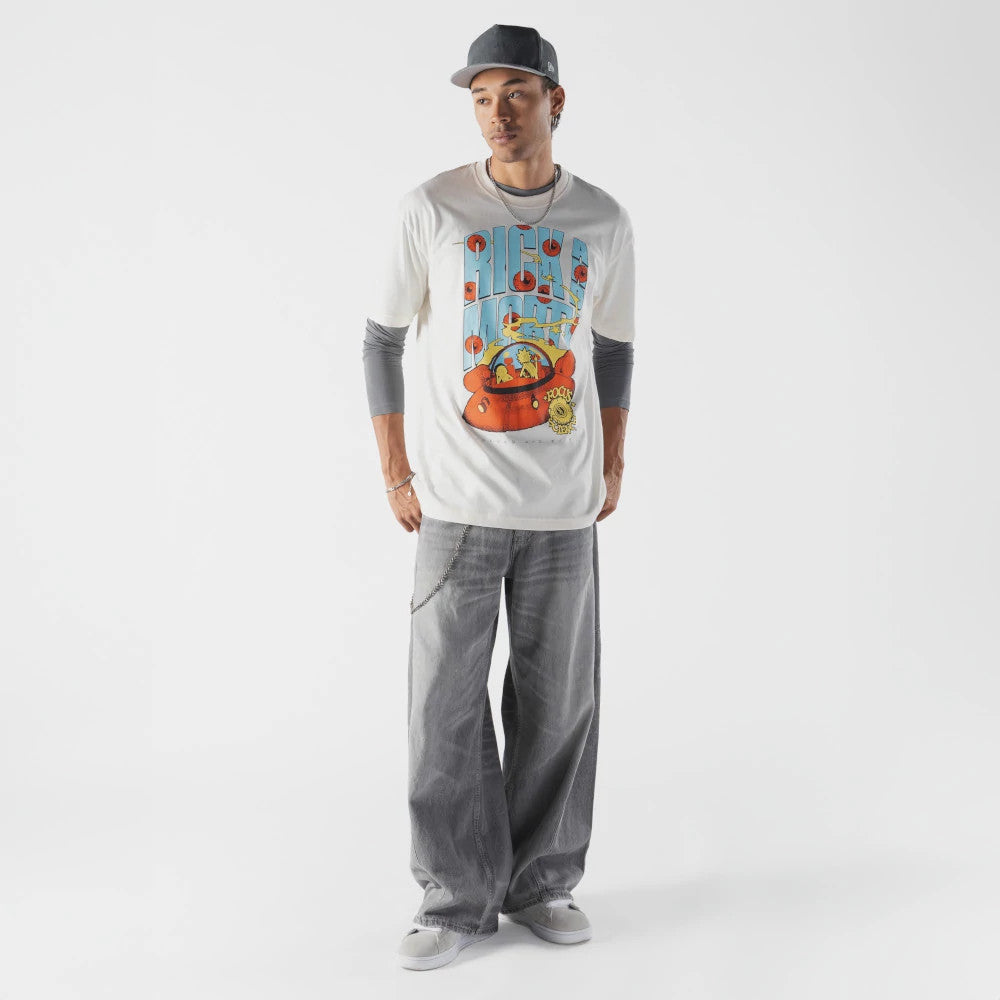 The model is wearing this Rick And Morty Spaceship T-Shirt in cream. 3