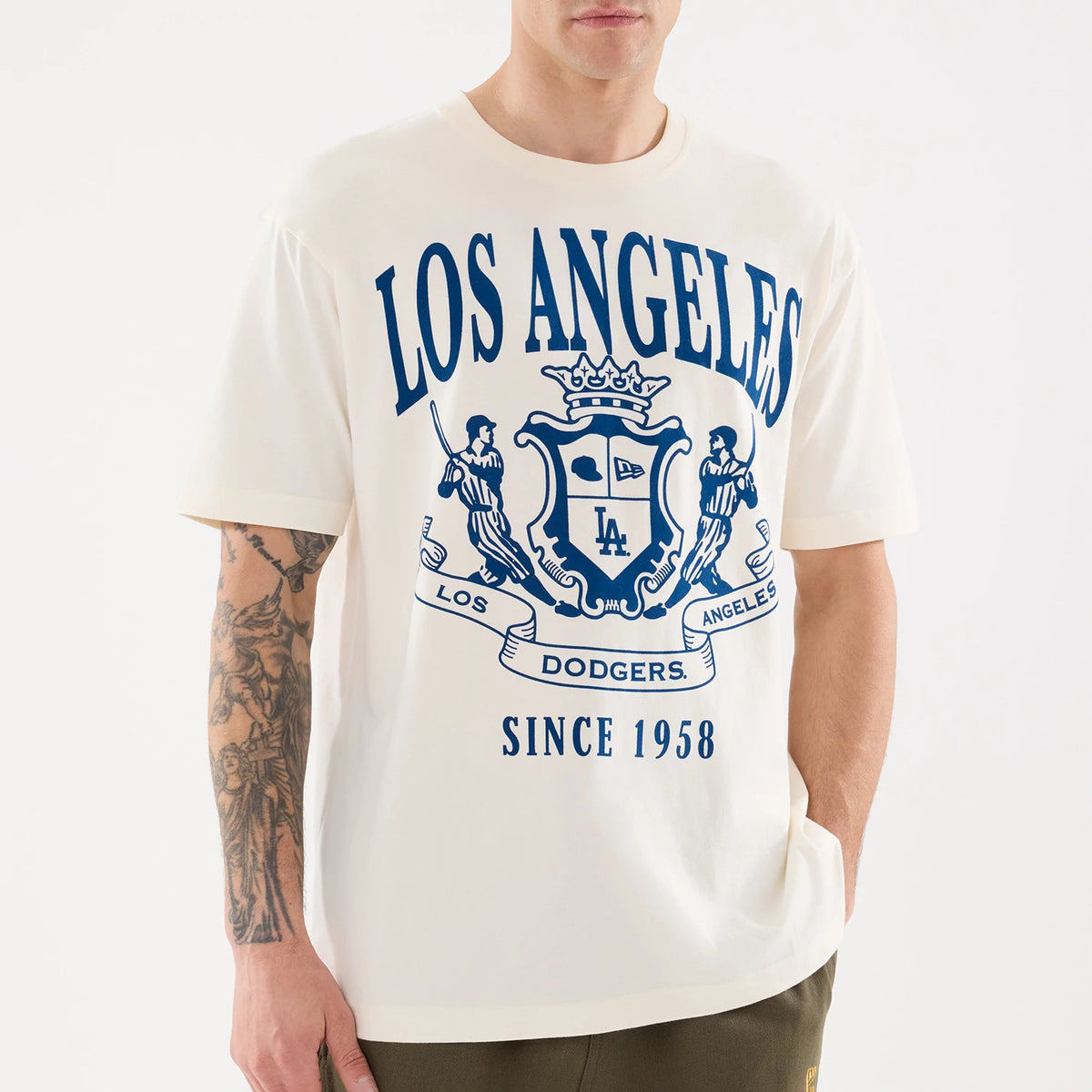 The model is wearing this MLB Life Graphic LA Dodgers T-Shirt in light beige. 4