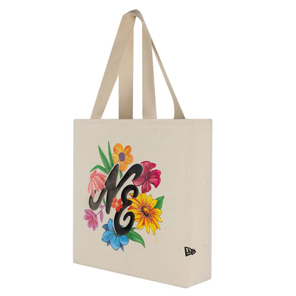Pictured is this New Era Graphic Tote Bag in light beige. 1