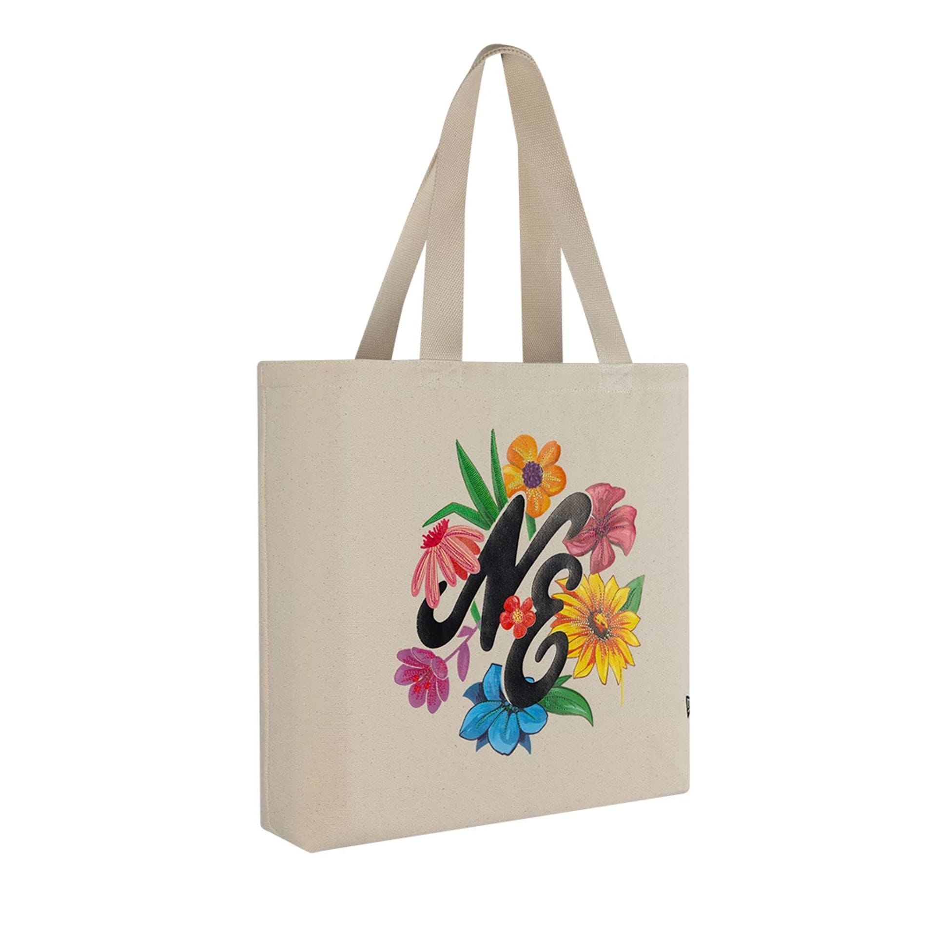 Pictured is this New Era Graphic Tote Bag in light beige. 3