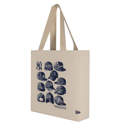Pictured is this MLB Cap Graphic New York Yankees Tote Bag in light beige. 1