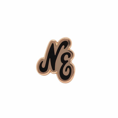 Pictured is this New Era Script Herritage Connect Rose Gold Pin Badge in rose gold. 1