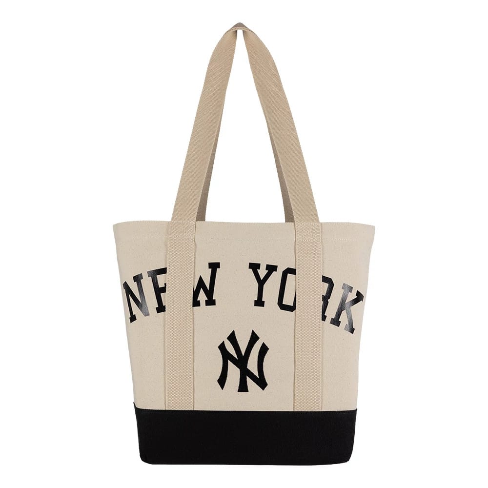 Pictured is this MLB New York Yankees Script Tote Bag in light beige. 3