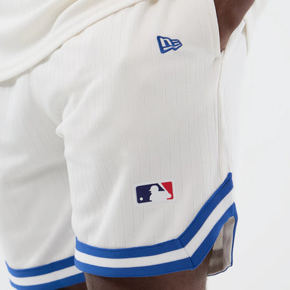 The model is wearing this MLB Arch LA Dodgers Oversized Shorts in open white. 4