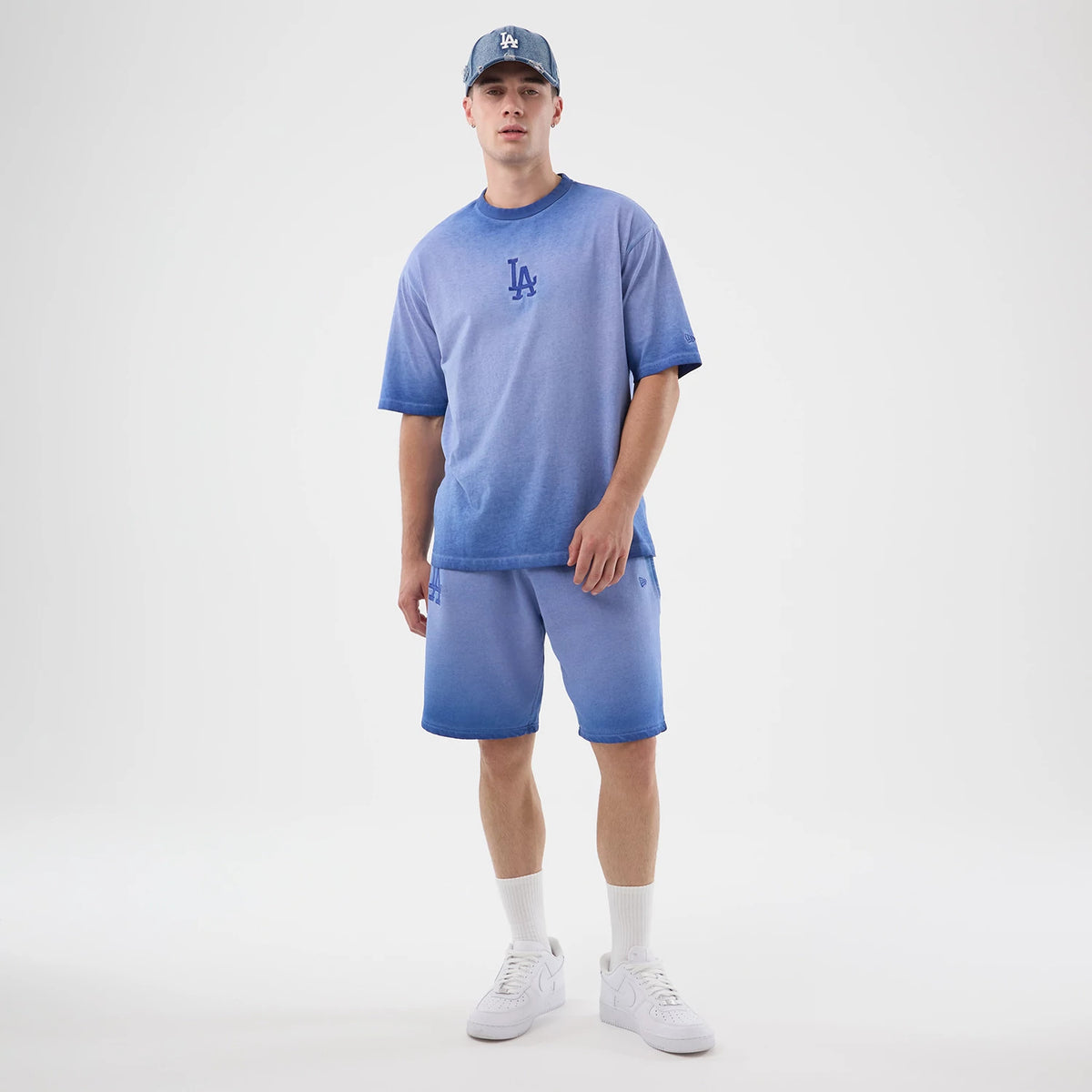 The model is wearing this MLB Washed Logo LA Dodgers T-Shirt in pastel blue. 8