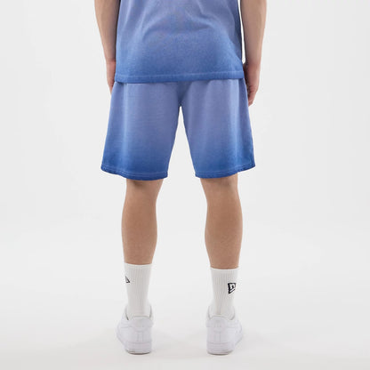 The model is wearing this MLB Washed Logo LA Dodgers Shorts in pastel blue. 3