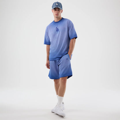 The model is wearing this MLB Washed Logo LA Dodgers Shorts in pastel blue. 8