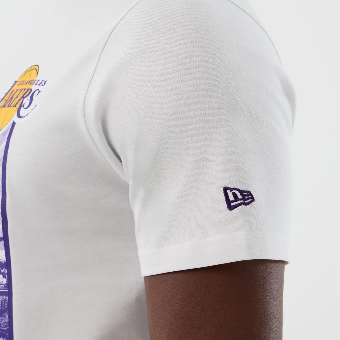 The model is wearing this NBA Graphic LA Lakers T-Shirt in white. 6