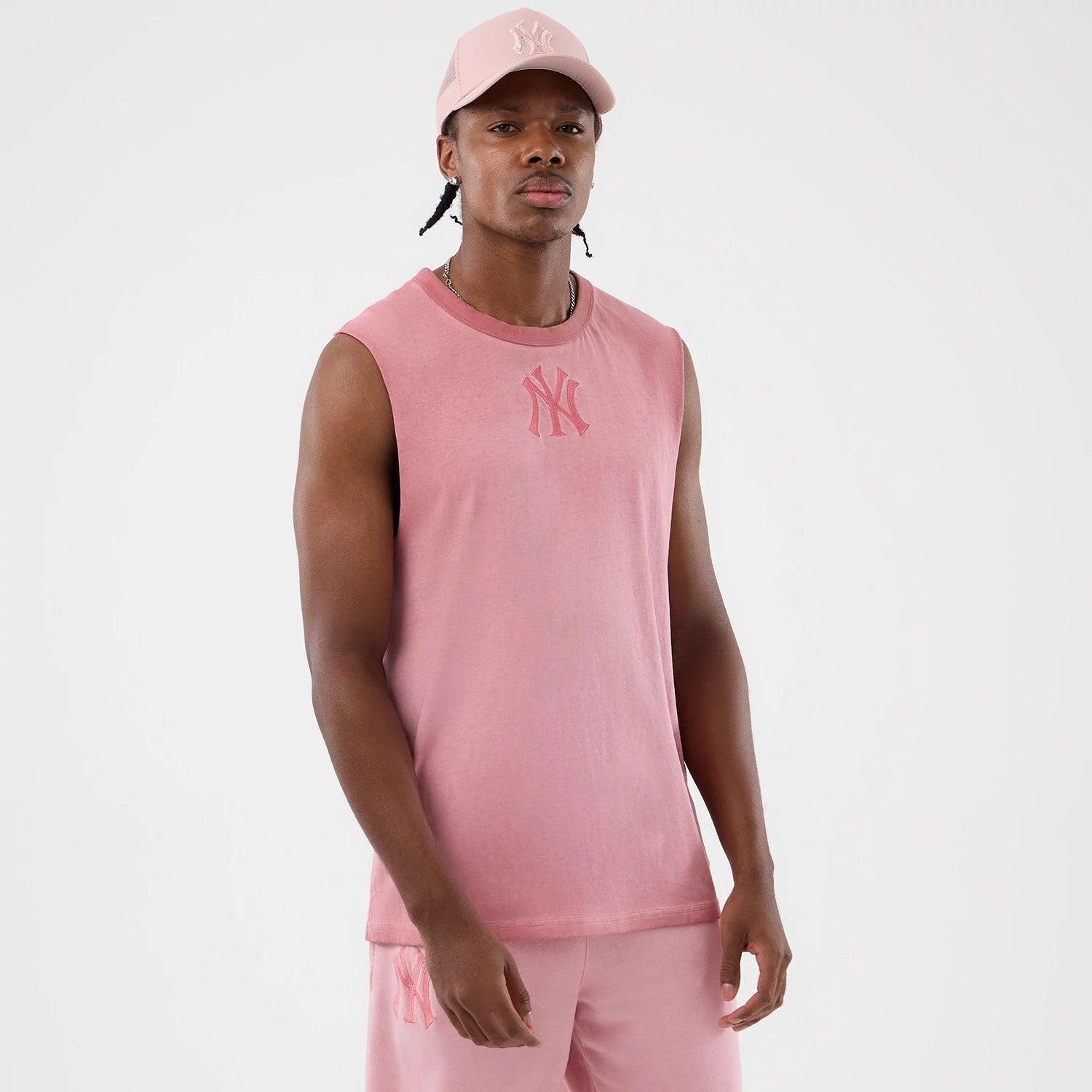The model is wearing this MLB Washed Logo New York Yankees Vest in pastel pink. 3