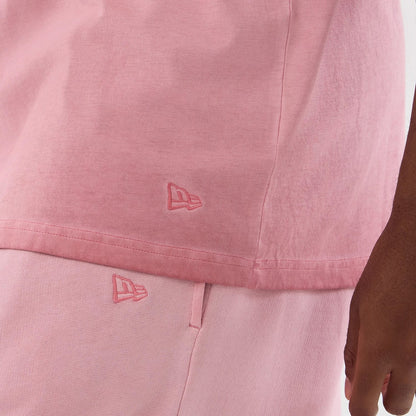 The model is wearing this MLB Washed Logo New York Yankees Vest in pastel pink. 7